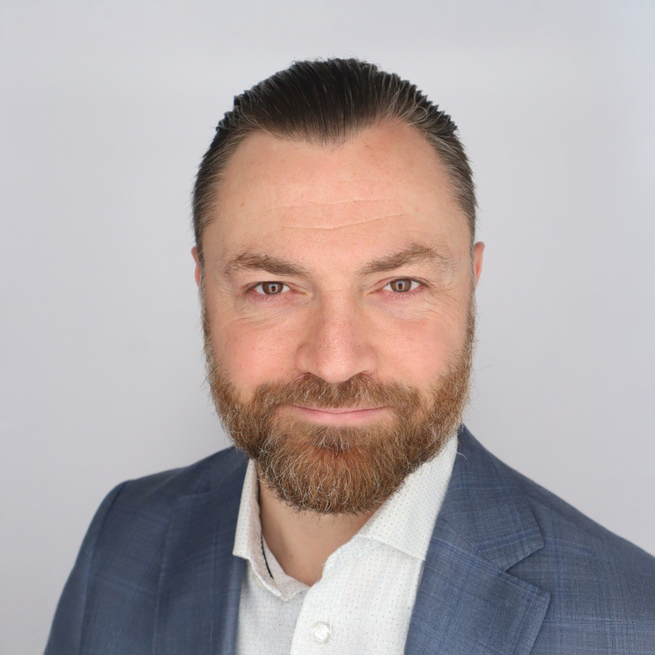 Professional headshot of Brett Beranek, General Manager of OPAL-RT TECHNOLOGIES